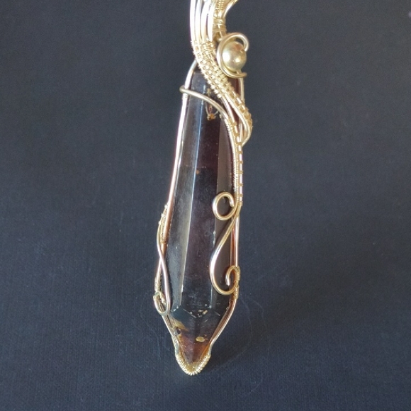 Jewelry - Elegant Gold and Black Wire-Wrapped Pendant